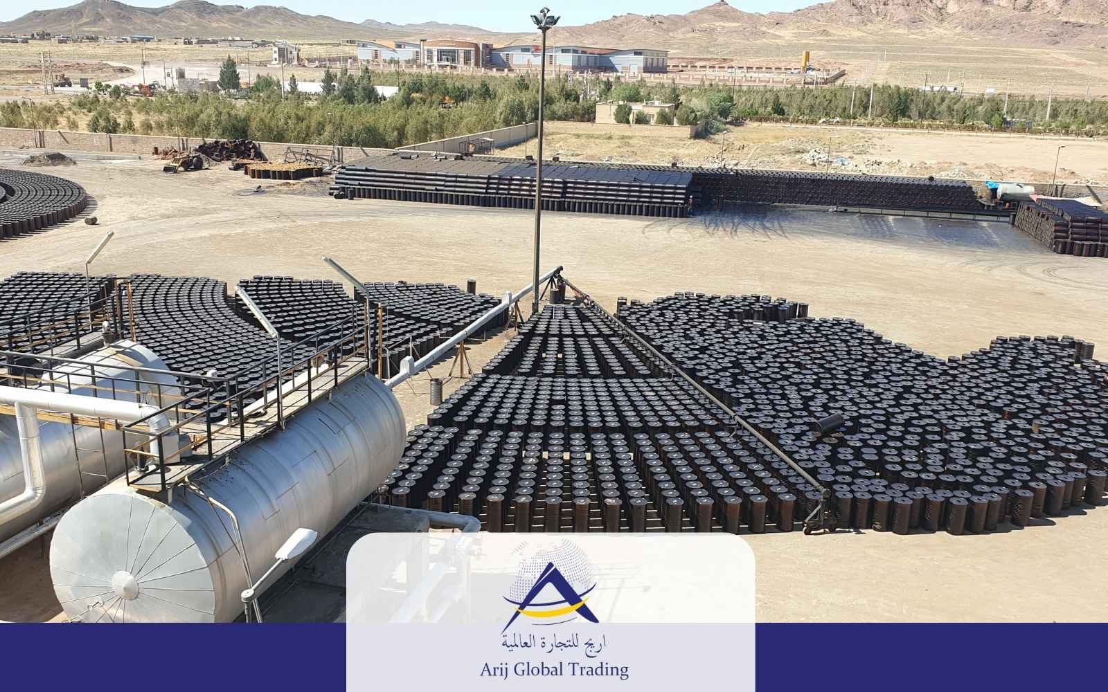 Thousands of steel drums filled with bitumen for road construction at Arij Global Trading’s facility, a trusted bitumen supplier and exporter