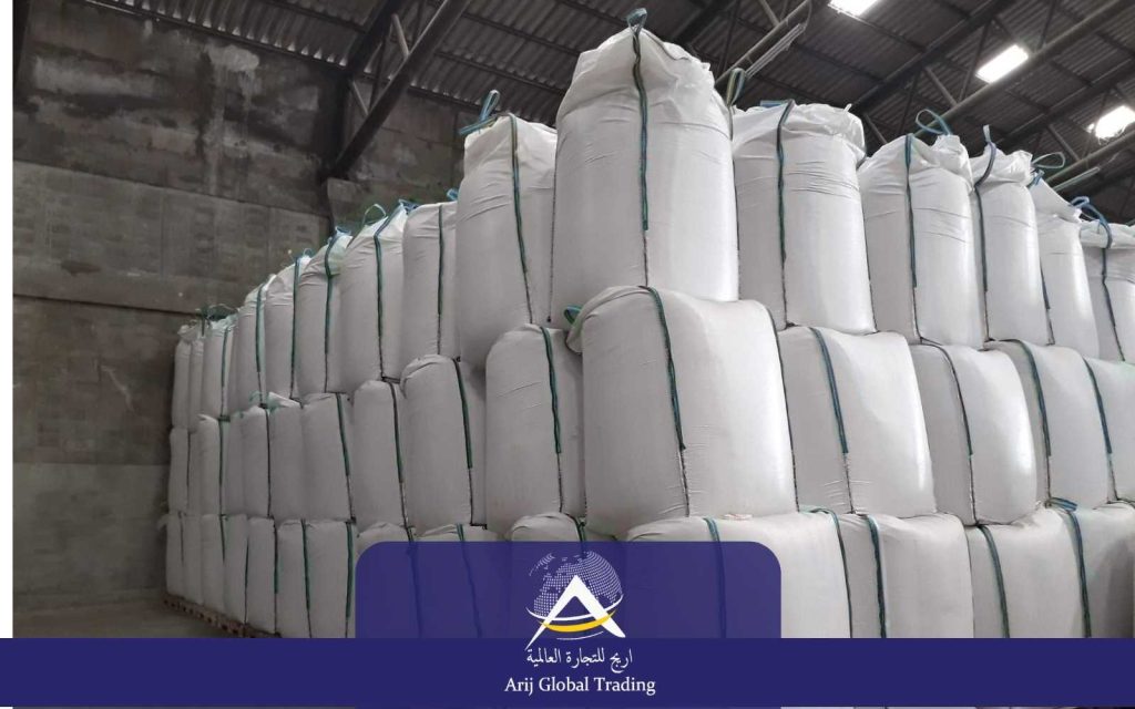 Stacked jumbo bags of urea in a warehouse, showcasing ArijCo’s capacity as a wholesale urea supplier for global markets