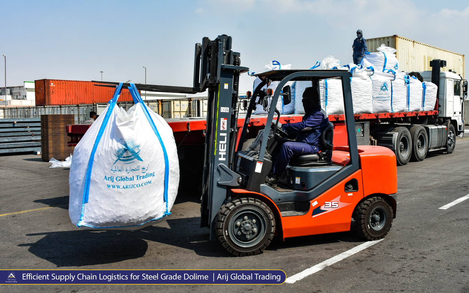 Efficient Supply Chain Logistics for Steel Grade Dolime... Logistics team loading multiple white jumbo bags of Calcined Dolomite onto a truck, showcasing Arijco Global Trading’s reliable supply chain and bulk export capabilities.