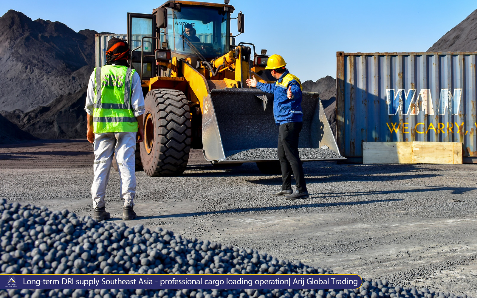 Heavy machinery loading Direct Reduced Iron (DRI) pellets at bulk terminal for Southeast Asia steel mills long-term supply
