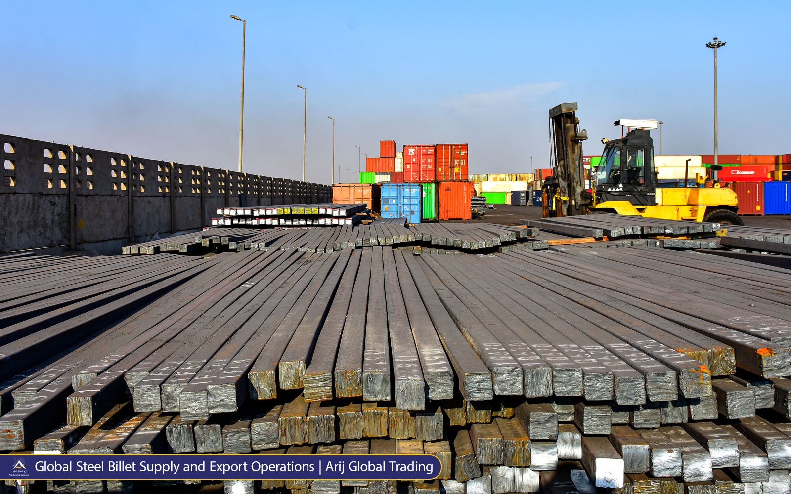 Steel billets stacked at a logistics yard with shipping containers and forklift operations, representing global steel export and supply chain management by Arij Global Trading.