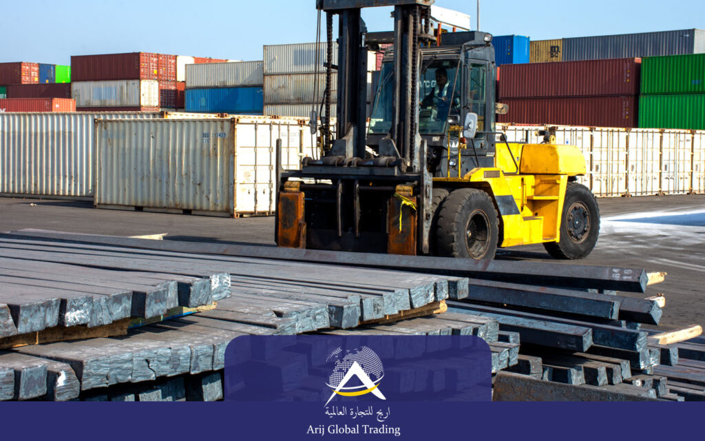 Heavy-duty forklift transporting steel billets at a global shipping port, surrounded by stacked containers. Arij Global Trading steel logistics operations.