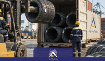 Wire rod coils being loaded into a shipping container for export by Arij Global Trading