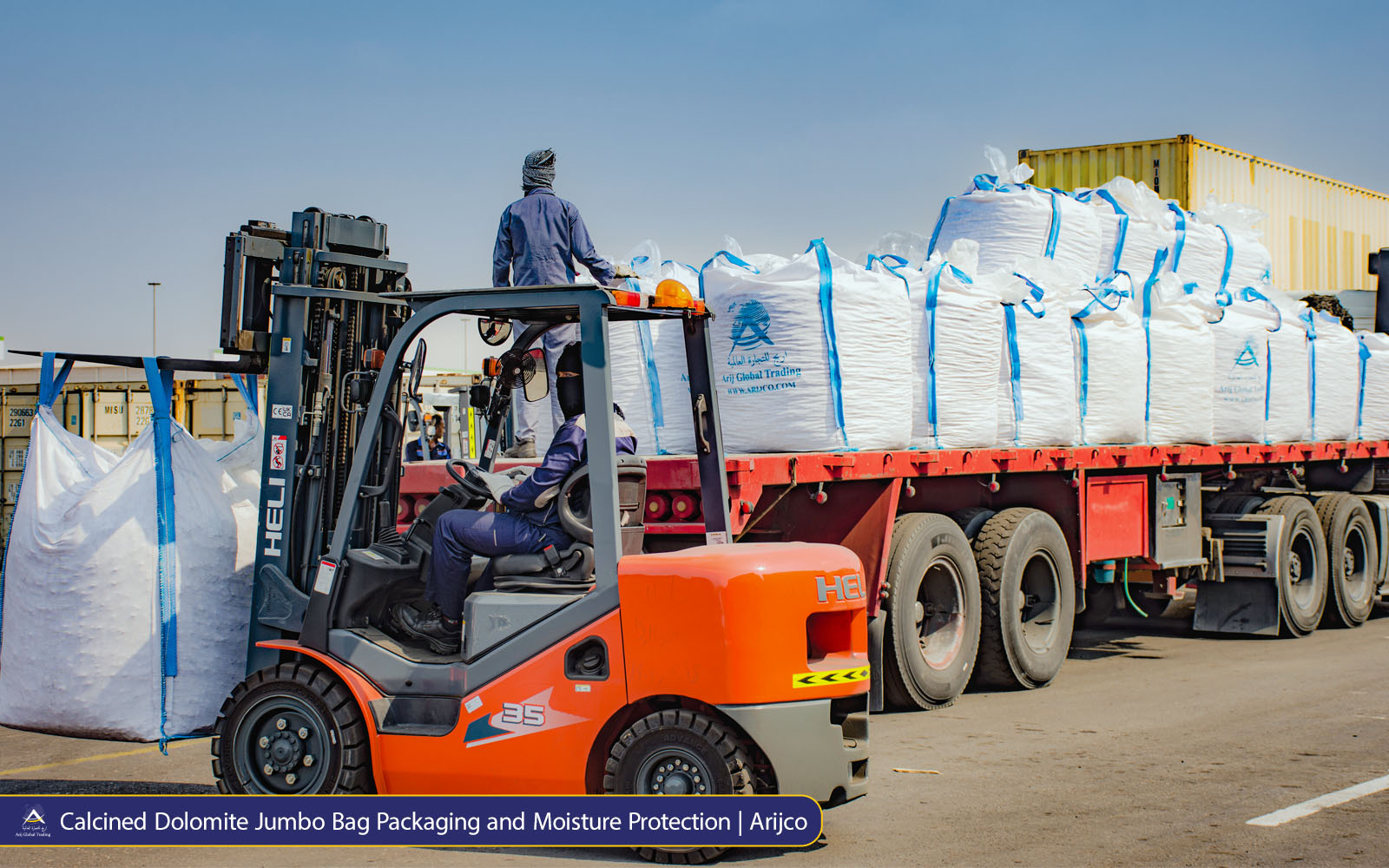 Protective plastic wrapping around industrial jumbo bags for moisture-sensitive mineral shipments