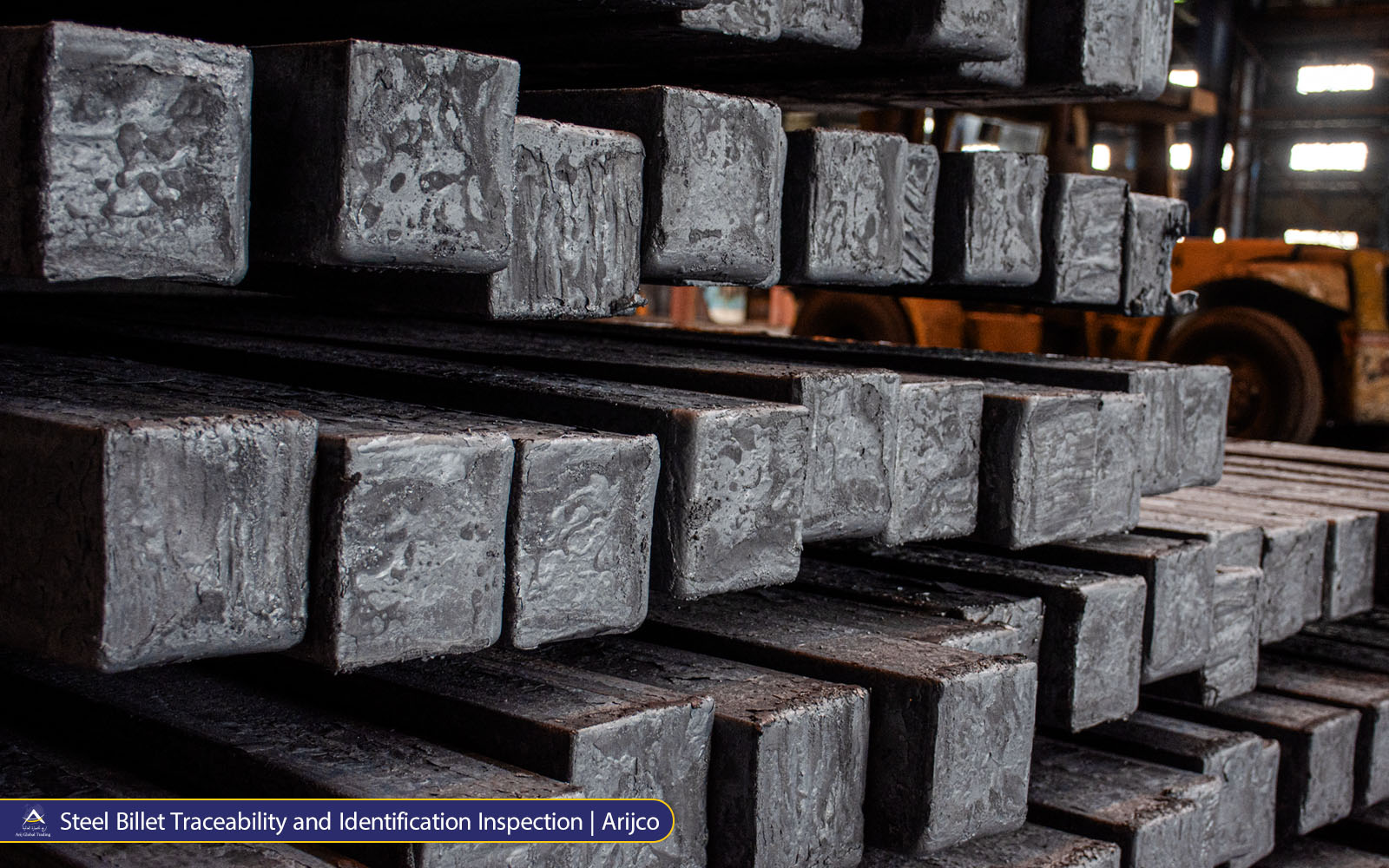 Steel Billet Traceability and Identification Inspection Arijco Stacked steel billets showing rough-cut surfaces and cross-sectional details during a visual quality and traceability inspection.
